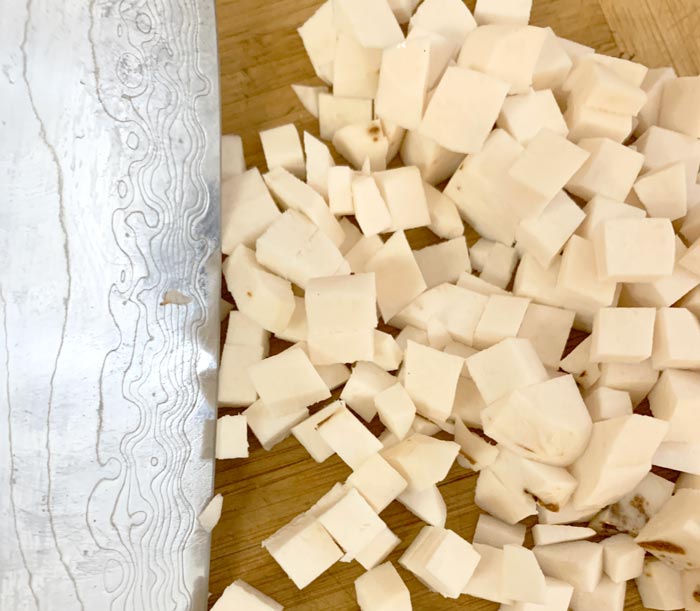 De-skinned American groundnut tubers diced into 1/4