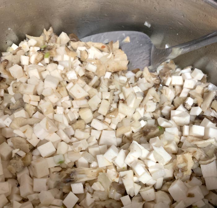 Maitake mushrooms, onions, and American groundnuts all diced to about the same 1/4