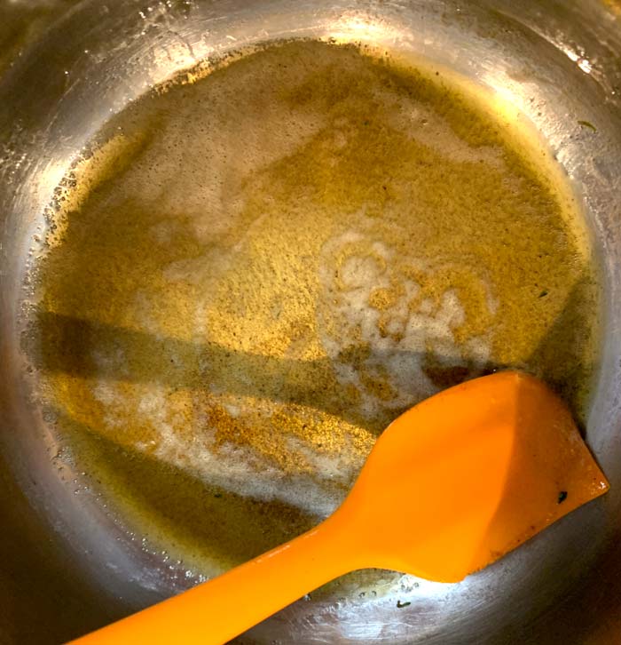 Brown butter, just done. Note the brown/toasted milk solids at the bottom of the pan. Now is when you want to immediately add your diced rosemary, not before.