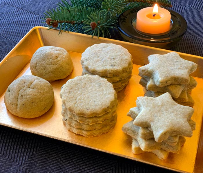 Christmas tree sugar cookies combine the wonderful rosemary-citrus flavors of edible conifer needles and the sweet richness of sugar cookies.