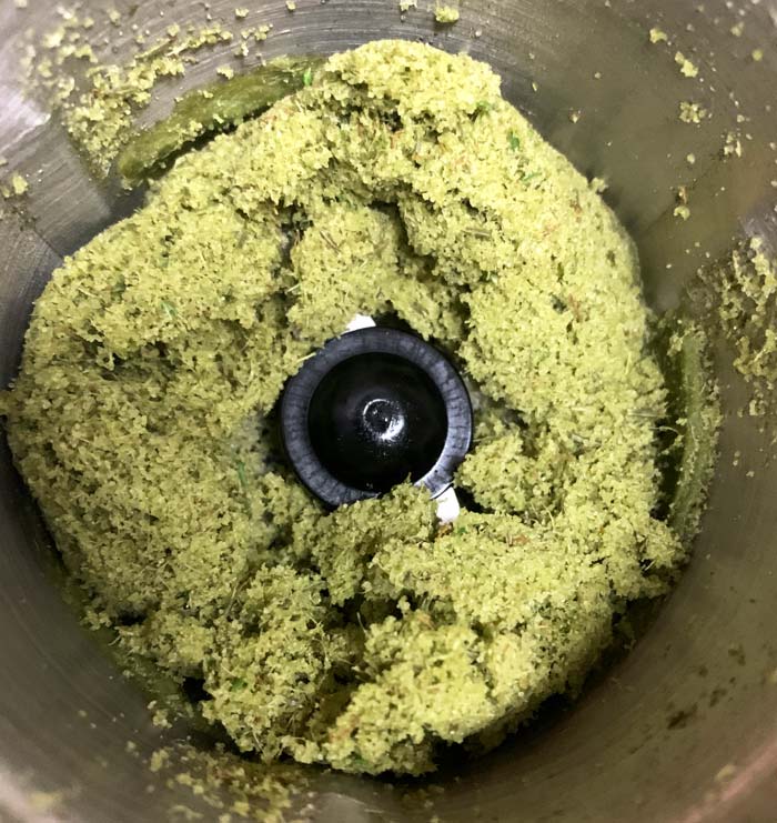 Making Christmas tree sugar in our Cuisinart SG-10 spice grinder. More sugar is about to be added before grinding again, but you can already see how the needles are being eviscerated by the specialized blades.