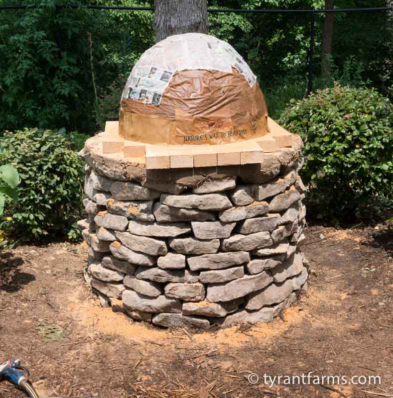 The sand dome + newspaper step. This looks like a Stone Age rendering of R2D2 from Star Wars.