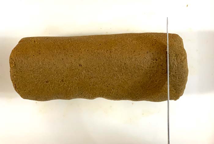 Once chilled, the acorn flour cookie dough is easy to shape and mold by hand. Roll it into a log then cut into ~ 1/2