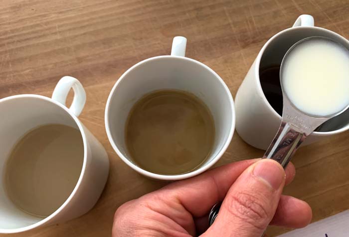 Adding dairy and sweetener vastly improved the flavor of the various samples, at least in our opinion (as people who don't like black coffee).