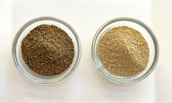 Comparison: small bowl of hot-leached acorn flour (left) vs cold-leached acorn flour (right). In our opinion, cold-leached acorn flour is a much better final product for baking (and flavor and nutrition), but it is also much harder to make — unless you happen to have access to a clean, unpolluted stream in which to leach your acorns.