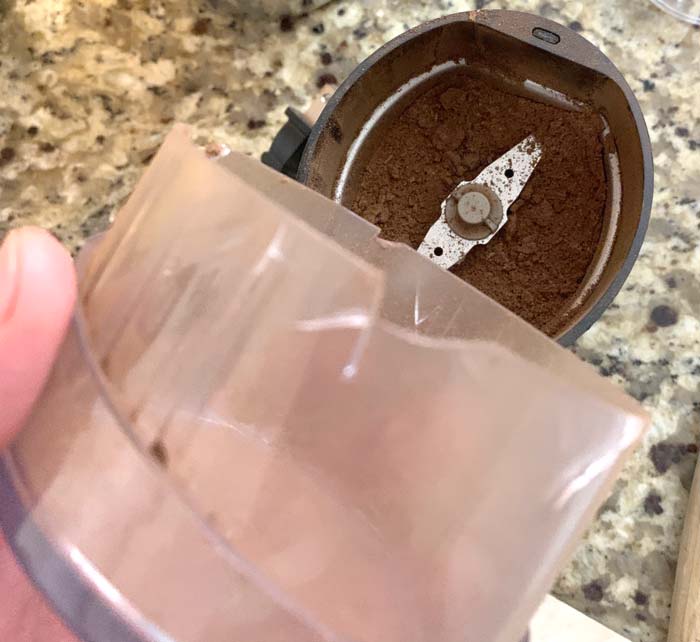 Our coffee grinder after grinding rock-hard American persimmon seeds.