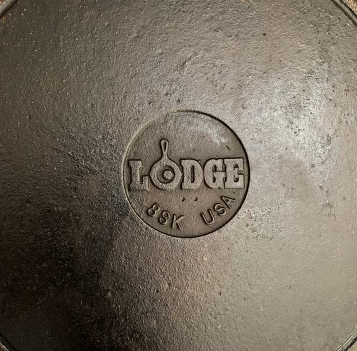 Branding on a modern Lodge cast iron pan with country of origin.
