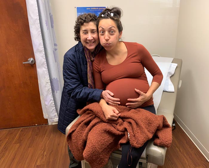 Lisa and Susan goofing around during a midwifery checkup.