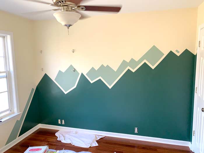 Paint tape all removed. Baby nursery mountain painting.