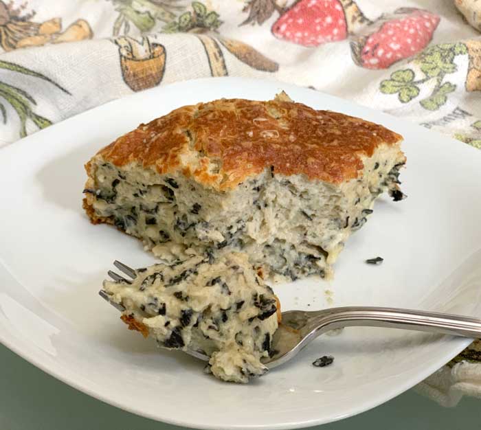 Black trumpet mushroom & smoked gouda souffle plated. 