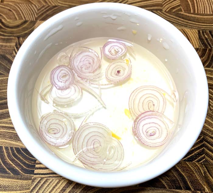 Chef David used pearl onions in his version of this recipe, but I used a shallot since that's what I had on-hand. I soaked the sliced shallot in ice water with a squirt of calamondin juice before plating, which made the raw shallot so much more pleasant and mellow.