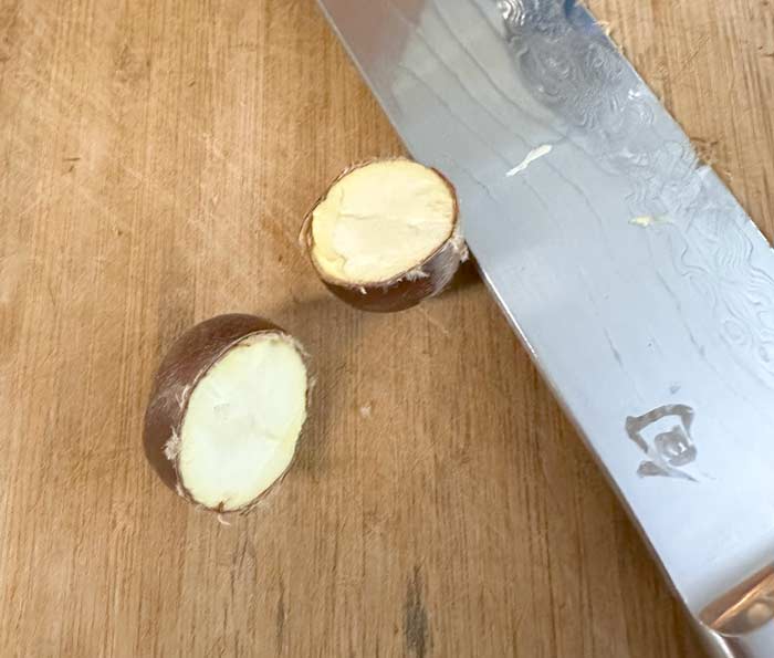 Chestnut cut in half.