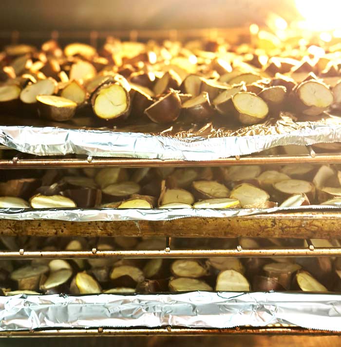 Use your middle oven racks, not the ones nearest the heating elements.