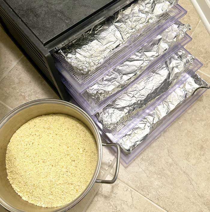 Cover drying racks with aluminum foil turned up on the sides to prevent the chestnut flour from spilling out.