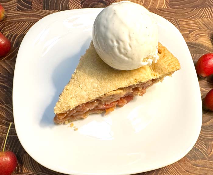 Crabapple pie with whole wheat crust, one of our very favorite fall recipes. Yes, this pie recipe is relatively healthy, although you can undo that by serving it with a scoop of vanilla ice cream.