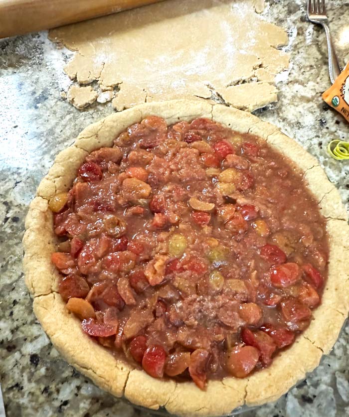 Filling pie crust.