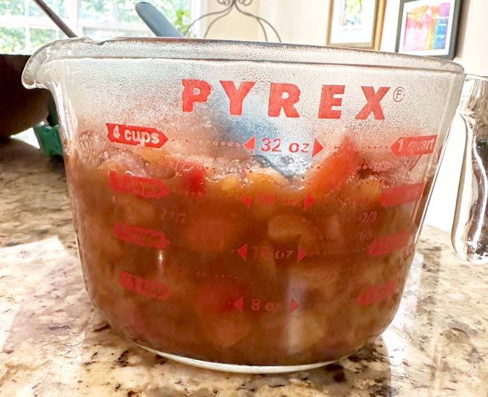 Avoid a pie baking mess by measuring your finished crabapple pie filling. If you end up with more than 3.5 cups, cook it a bit longer to reduce the water content. 