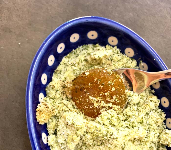 Extracting cured egg yolks from conifer needle/Christmas tree salt.