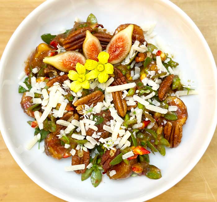 Fig & purslane salad with toasted pecans and balsamic-fig dressing.