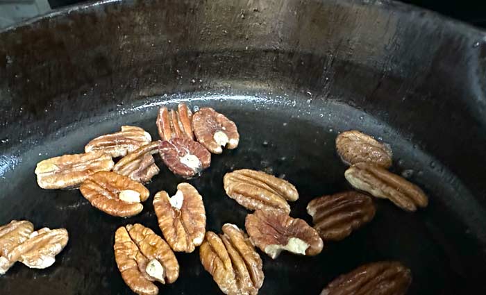 Toasting pecans.