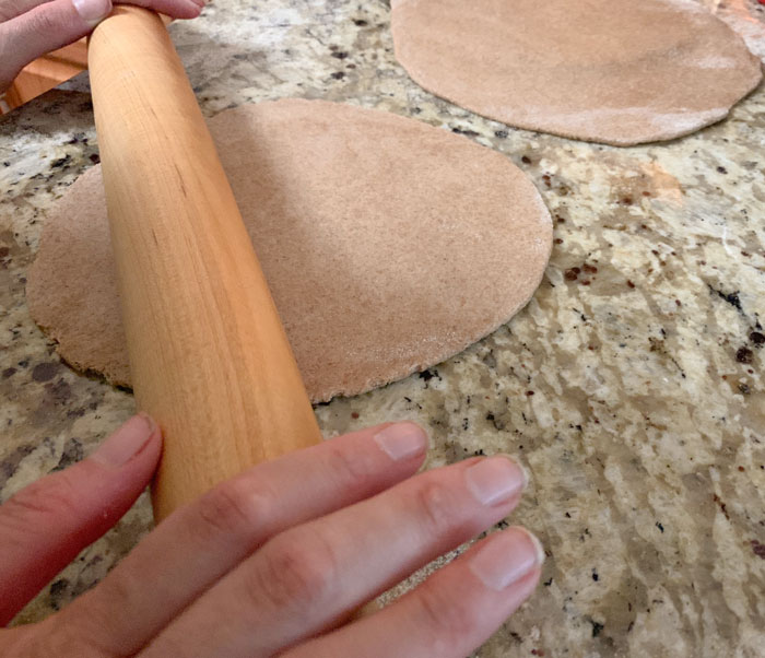 Rolling out the flatbreads. flatbread recipe