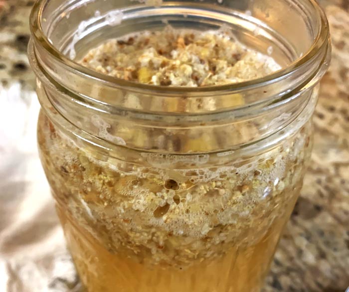 This is what your golden raspberry elderflower cordial will look like as it starts to ferment and get bubbly. Stirring it will make it even more bubbly until things settle back down.