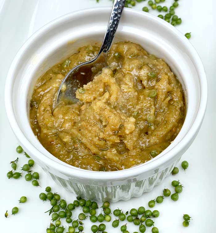 Green coriander and toasted pine nut paste.