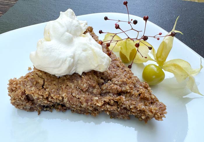 Ground cherry crumble made with 1 cup of ground cherries. This piece looks pretty but beauty is irrelevant. A scoop of gooey ground cherry crumble goodness in a bowl with a dollop of homemade whipped cream on top doesn't need to be pretty to taste perfect.