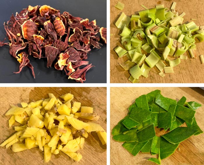 From top left to bottom right: dried Hibiscus roselles, diced lemongrass, baby ginger, and makrut lime leaves. A few of the essential flavors in this recipe. 
