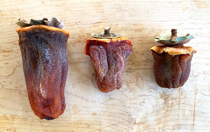 Asian persimmon varieties used in this hoshigaki taste test from left to right: Hachiya, Ichi Ki Kei Jiro, Fuyu.