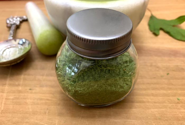 Homemade filé powder in a spice jar. 