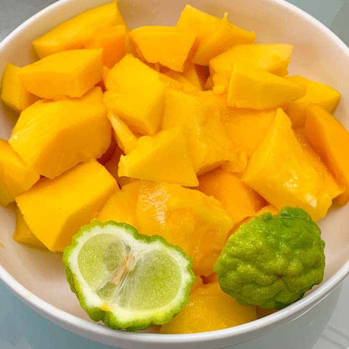 A special day for us: we were able to get home-grown papaya and makrut limes at the same time! Makrut lime juice is far more intense than regular lime juice but still quite good on papaya.