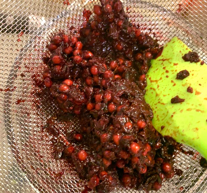 When straining, use something like a silicone spatula to push as much wild cherry pulp through the strainer as possible while removing the seeds. Scrape the bottom side of the strainer to get all those good bits!