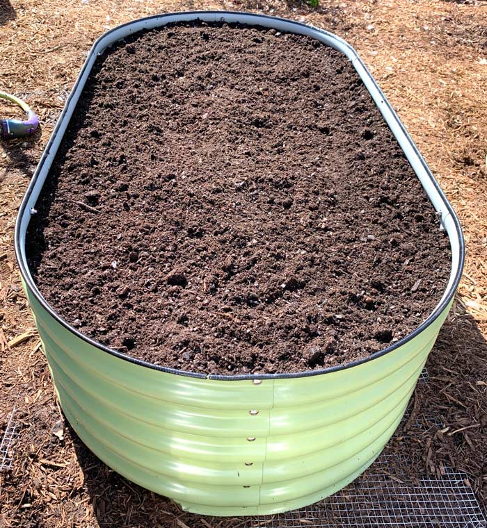 New no-dig raised beds ready to plant - but not quite finished...