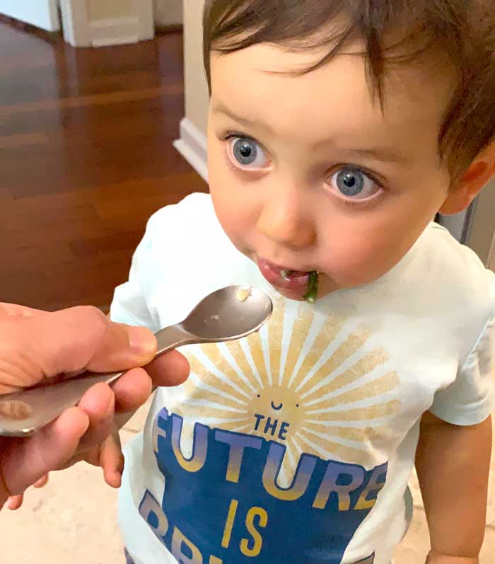 Sebastian the toddler taste-testing the final dish before it's plated. Yes, he loved it!