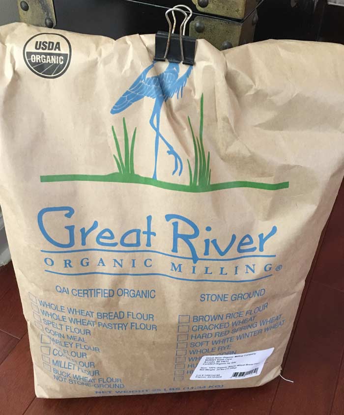 Our 25 lb bag of Great River certified organic stone ground whole wheat flour.