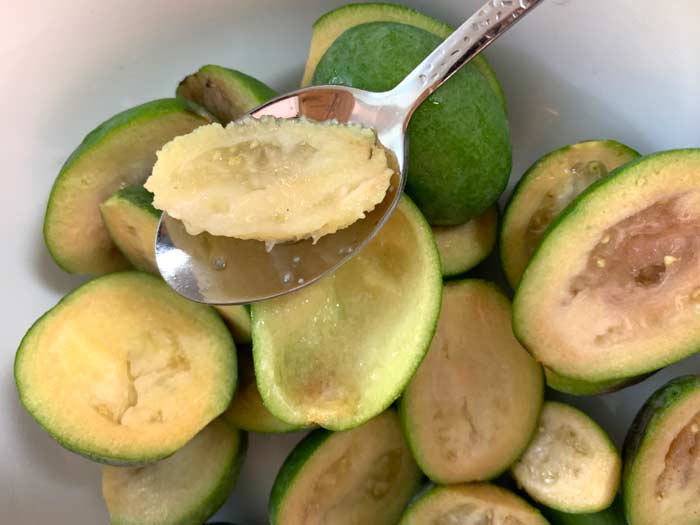 Scoop/scrape out the inner pulp of your pineapple guava fruit. Do not use the skins or your ice cream texture and consistency won't be right.