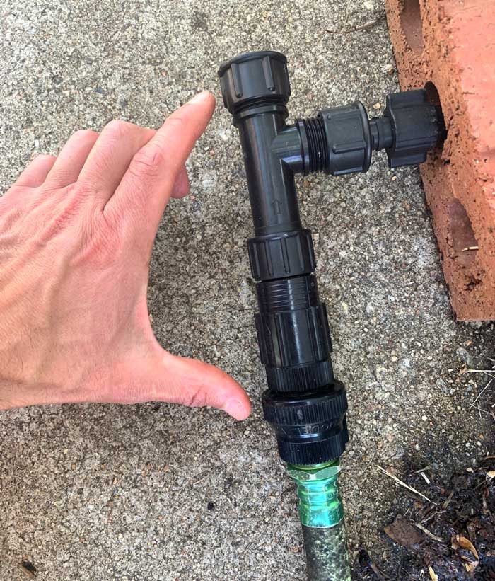 Three parts in one (you just have to screw them together): backflow prevention valve + pressure regulator + filter.