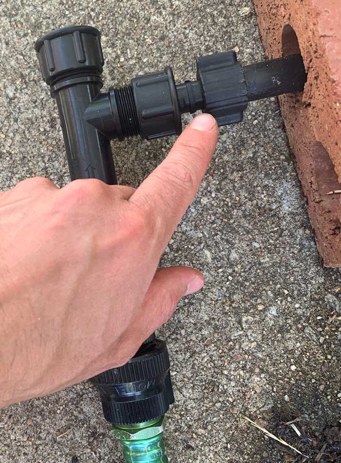 The piece that connects between your backflow prevention valve/pressure regulator and your primary irrigation line.