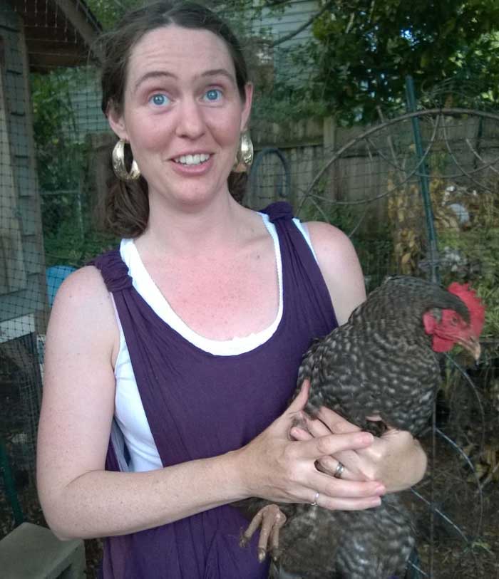 Eliza and a chicken who is very used to being handled by its humans.