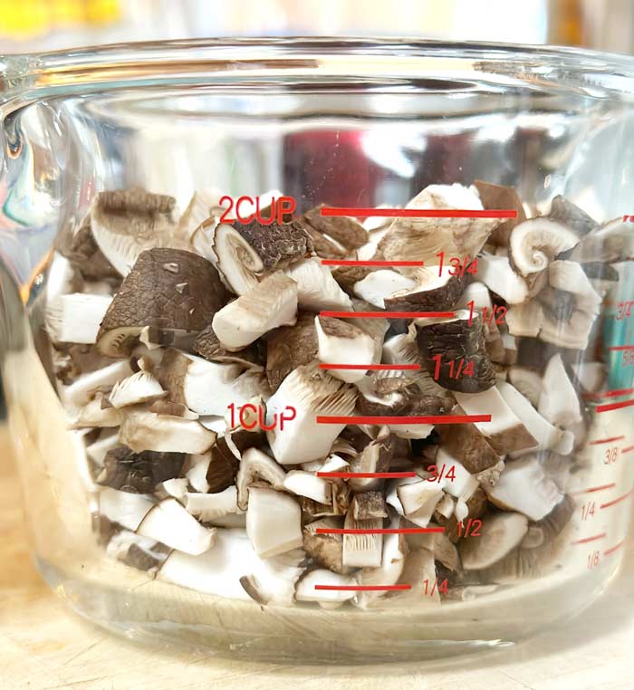 Diced shiitakes from our logs heading towards their soupy demise.