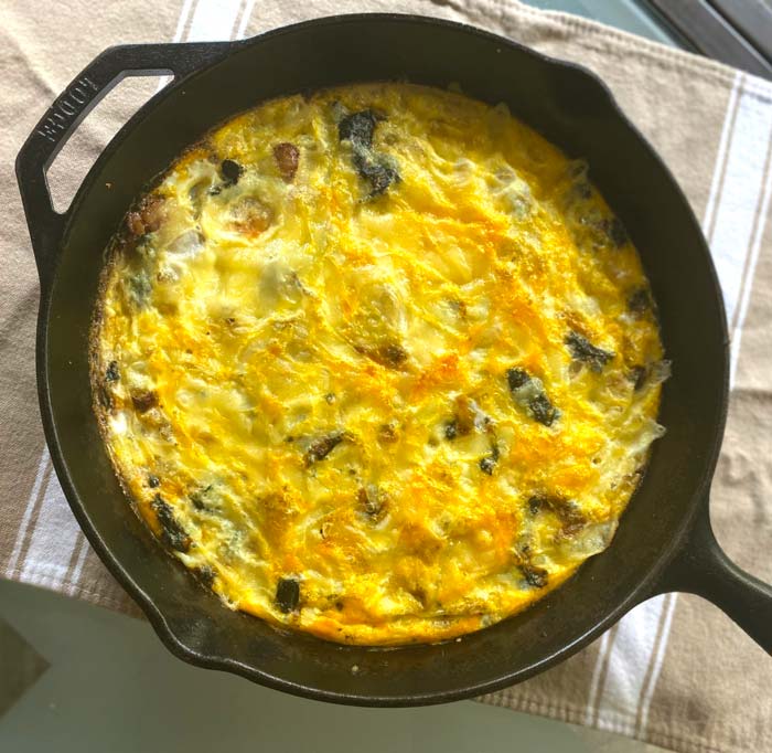 Stinging nettle frittata fresh out of the oven and ready to be served. Stinging nettle frittata recipe by Tyrant Farms.