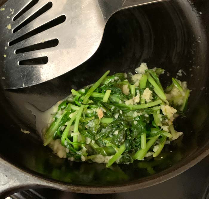 Stridolo sauteed with garlic in olive oil; deglaze the pan with white wine then add it to the soup at the very end so you don't overcook the stridolo.