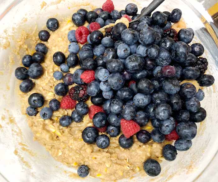 Making summer breakfast bread - Adding and folding in the berries.