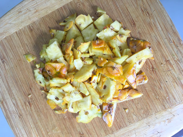 We only use pineapple skins in our tepache recipe, because we love eating our garden-fresh pineapples. Once we finish making tepache, the skins go into the compost to make more soil to grow more food (including pineapples).