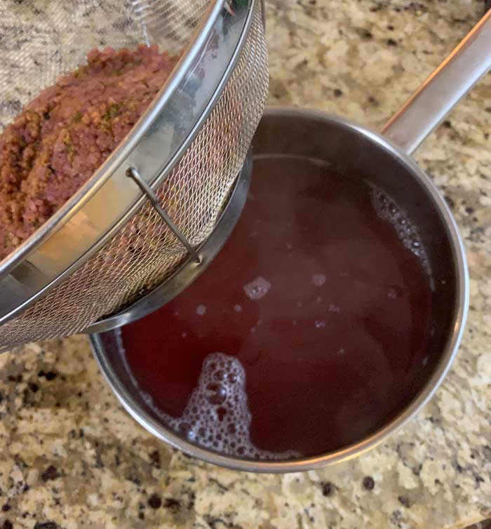 The first strain removes the beautyberry pulp and seeds.