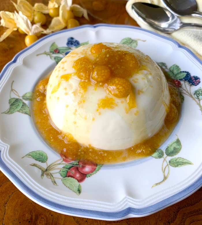 Panna cotta with ground cherry bourbon sauce.